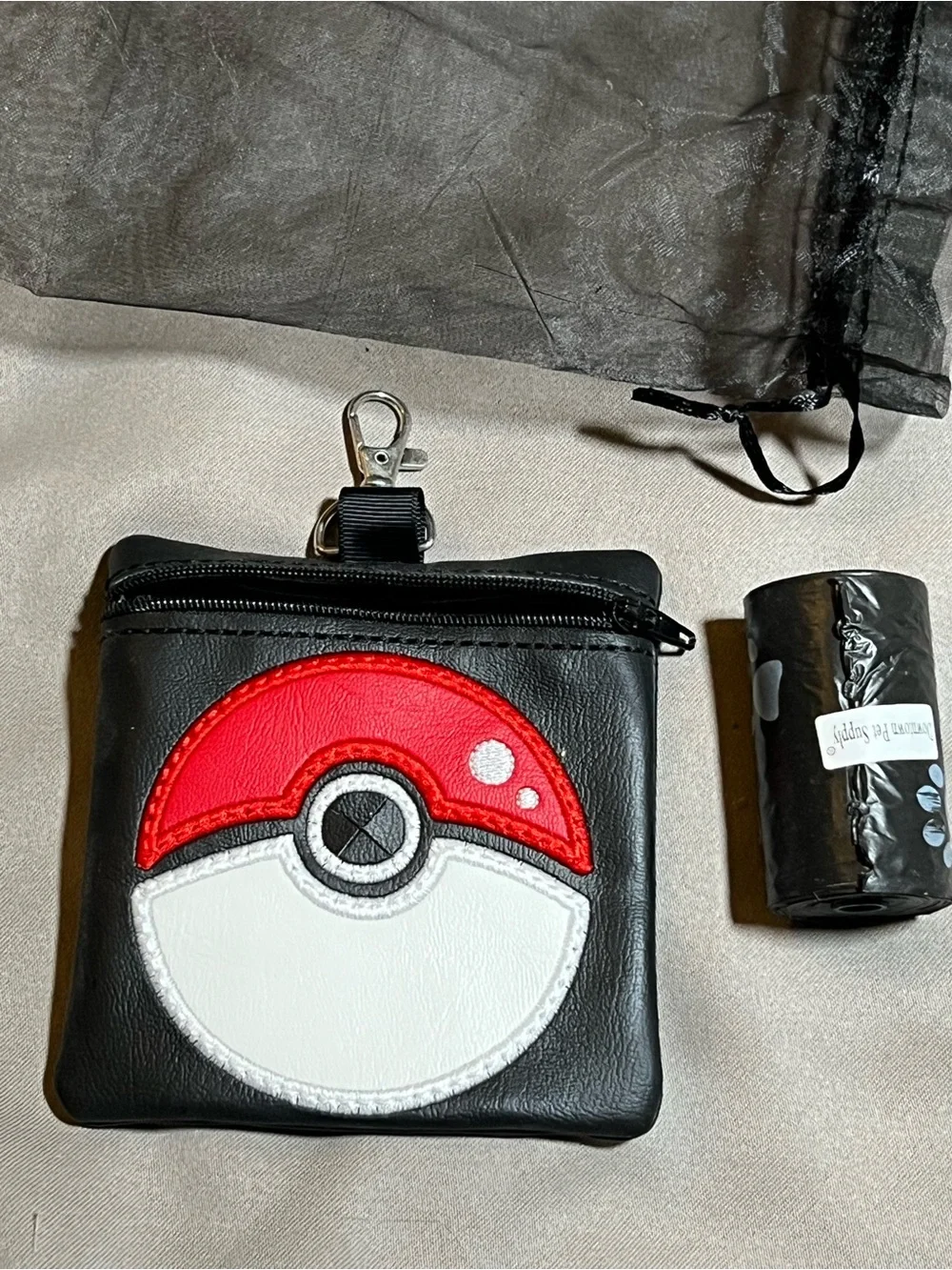 Pokemon doggie poop bag dispenser Black with Red & White Poké Ball Patch new 🆕